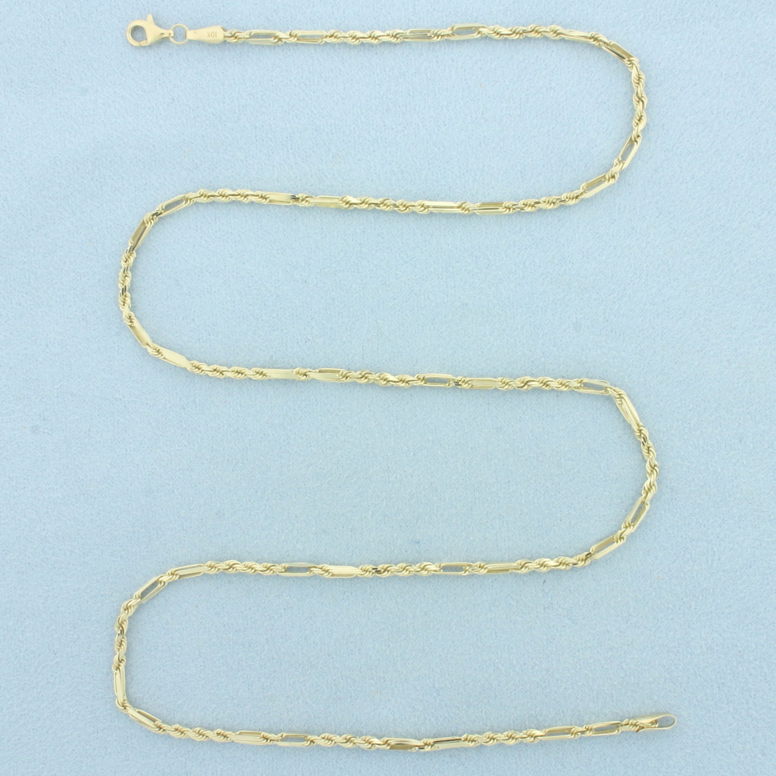 20 Inch Milano Link Chain Necklace in 10k Yellow Gold: In 10k Yellow Gold. 20 inches long. 2.1mm wide. Lobster clasp. 7.6g.