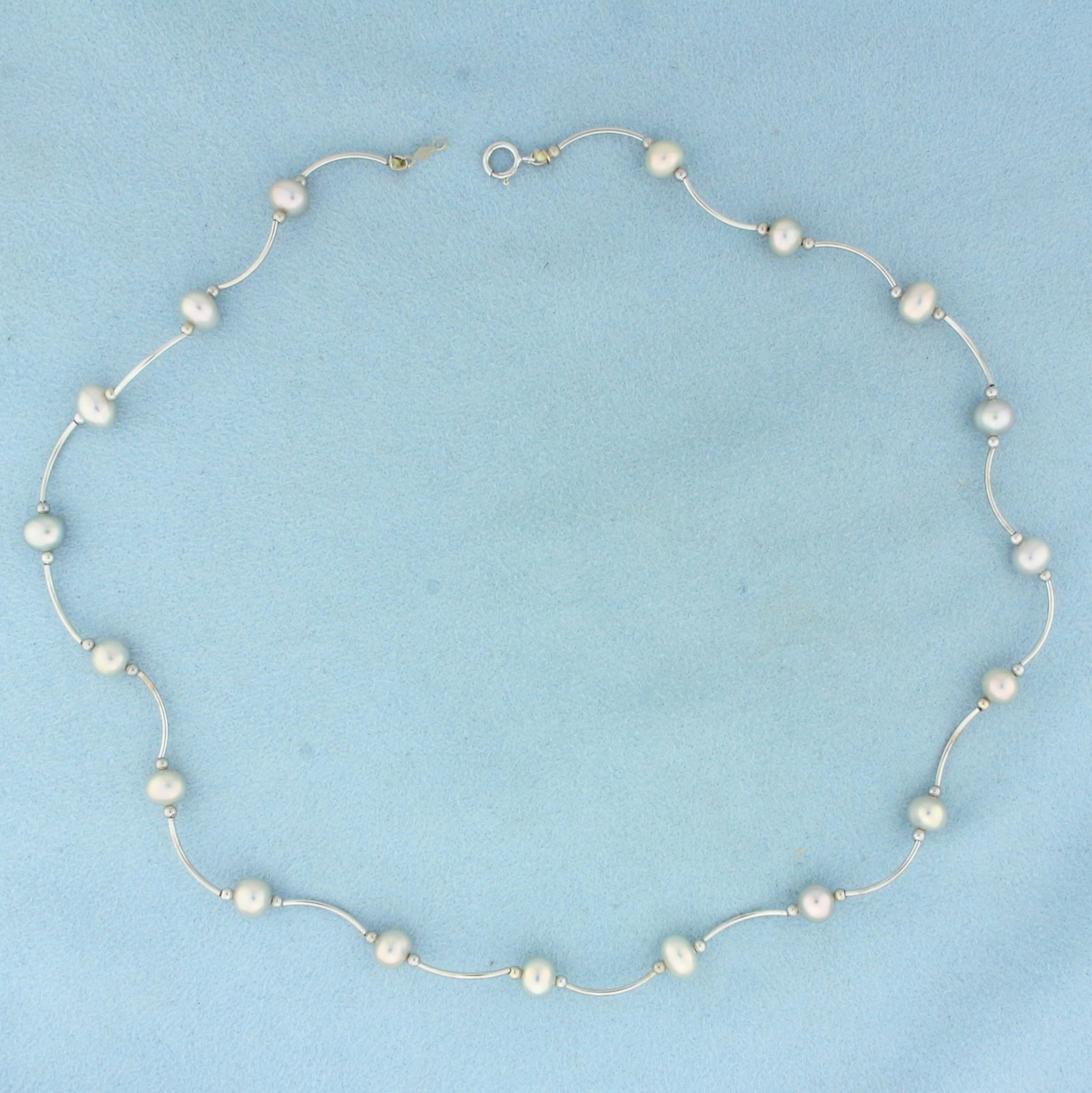 16 Inch Silver Pearl Station Choker Necklace in 14k White Gold: In 14k White Gold. Contains 6mm high quality Silver Pearls with high luster. 16 inches long. Spring clasp. 5.8g.