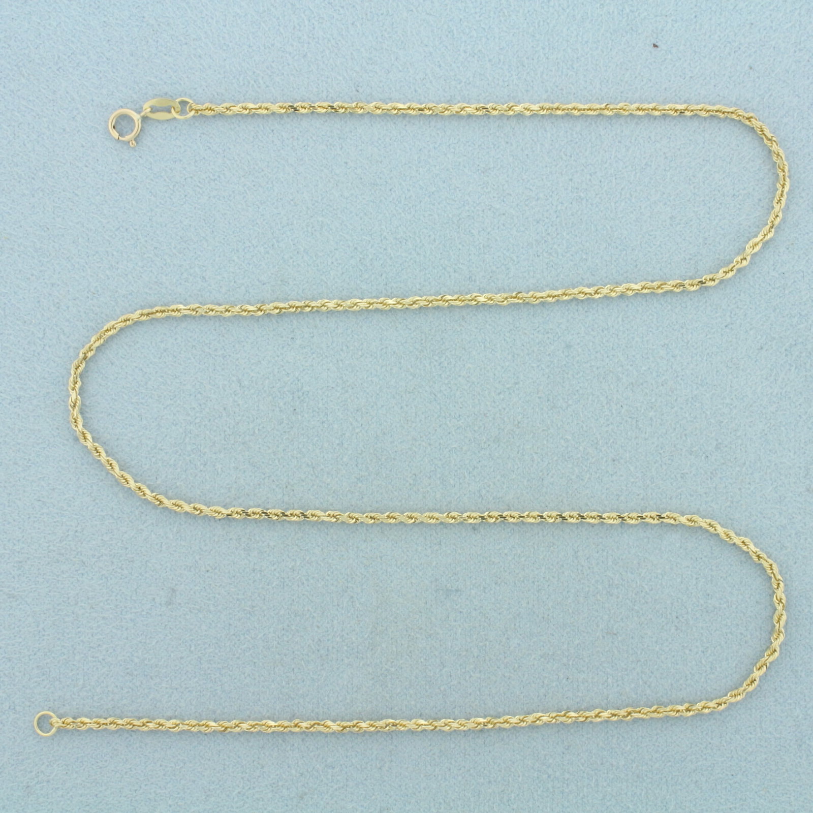 16 Inch Rope Link Chain Necklace in 10k Yellow Gold: In 10k Yellow Gold. 16 inches long. 1.7mm wide. Spring clasp. 3.1g.