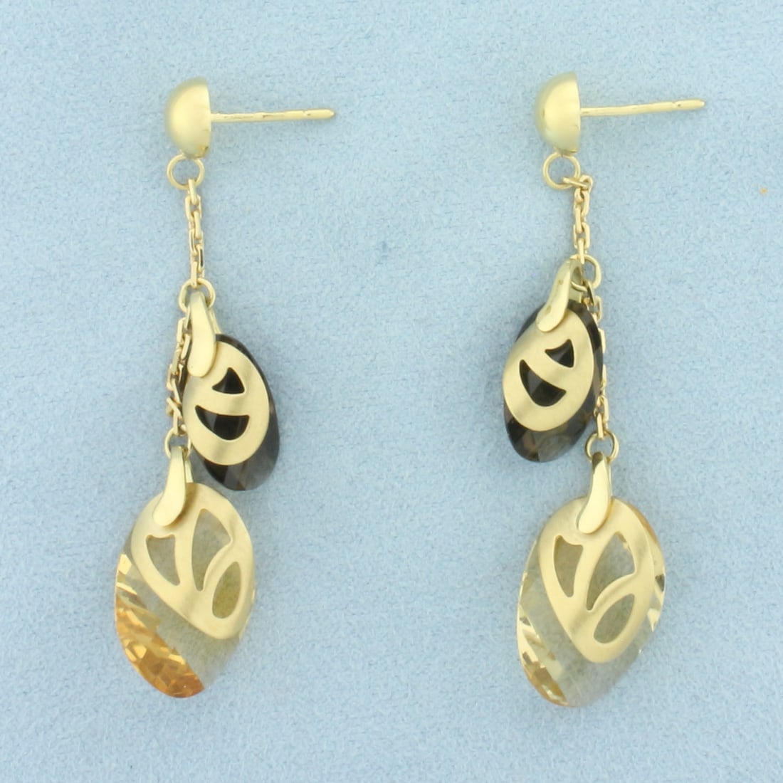 Italian Designer Smoky Quartz and Citrine Dangle Earrings in 14k Yellow Gold: In 14k Yellow Gold. Contains 18mm Citrine and 13mm Smoky Topaz high quality gemstones. 2 1/4 inches long. 1/2 inch wide. Italian made. Friction backs not included. 8.7g.