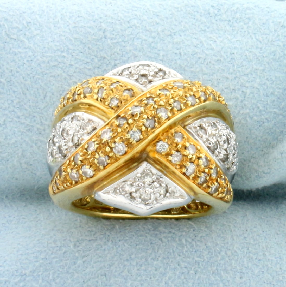 Designer Diamond Criss Cross Statement Ring in 18K Yellow and White Gold: In 18K Yellow and White Gold. Contains sixty eight high quality .015ct round brilliant Diamonds, 1ct TW, SI clarity/H color. Size 6. 14.9g