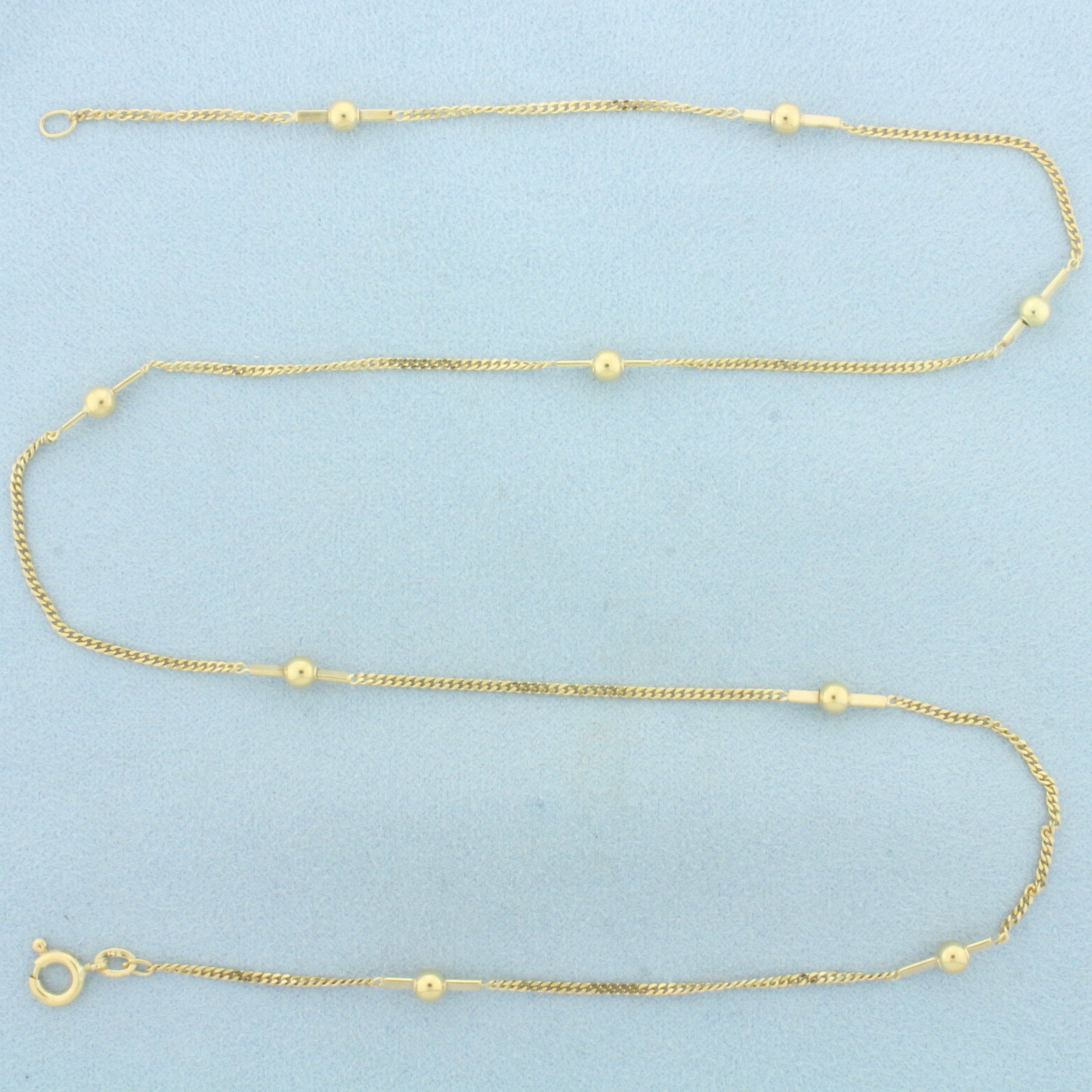 21 Inch Ball Bead Link Bar Necklace in 14k Yellow Gold: In 14k Yellow Gold. 21 inches long. 1.5mm wide chain. 4mm wide gold ball beads. Italian made. Spring clasp. 5.2g.