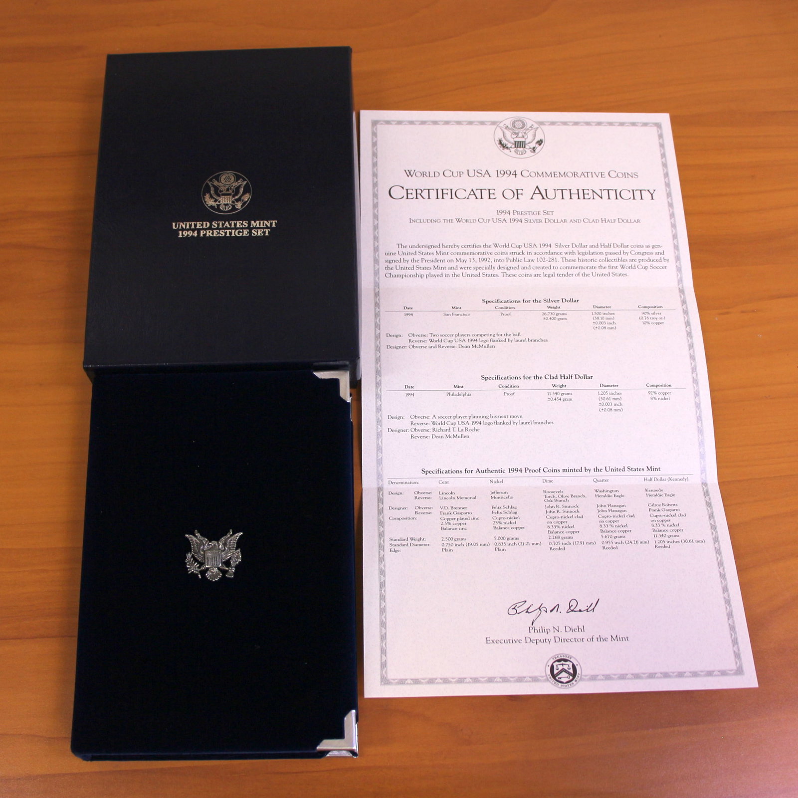 US Mint World Cup USA Prestige Coin Set OGP`: 1994 United States Mint World Cup USA Prestige Set including 1994 90% Silver Commemorative Silver Dollar. Set in original packaging and contains certificate of authenticity.