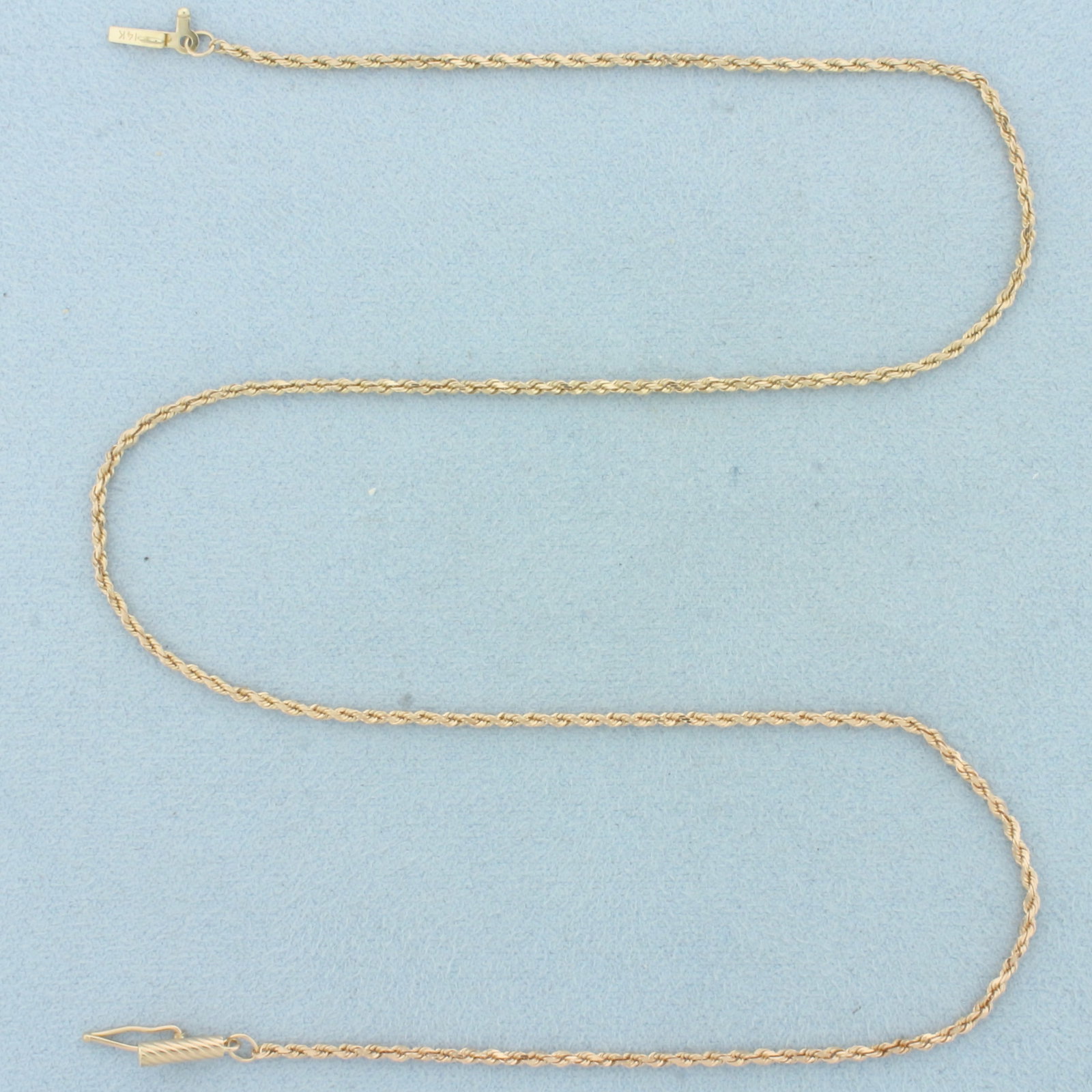 16 Inch Rope Link Chain Necklace in 14k Rose Gold: In 14k Rose Gold. 16 inches long. 1.7mm wide. Rope link. Slide clasp with safety latch. 3.7g.