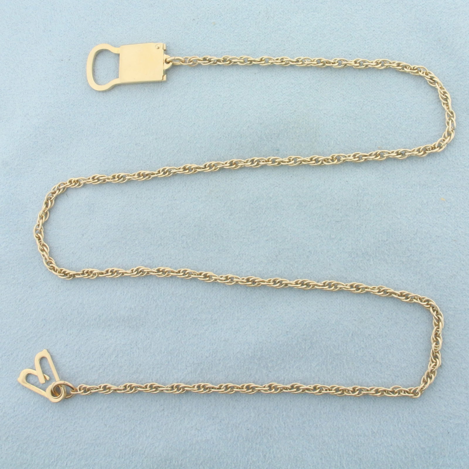 Unique Lock Chain Necklace in 10k Yellow Gold: In 10k Yellow Gold. 17 1/2 inches long. 2.5mm wide chain. Unique lock clasp. 9.5g.
