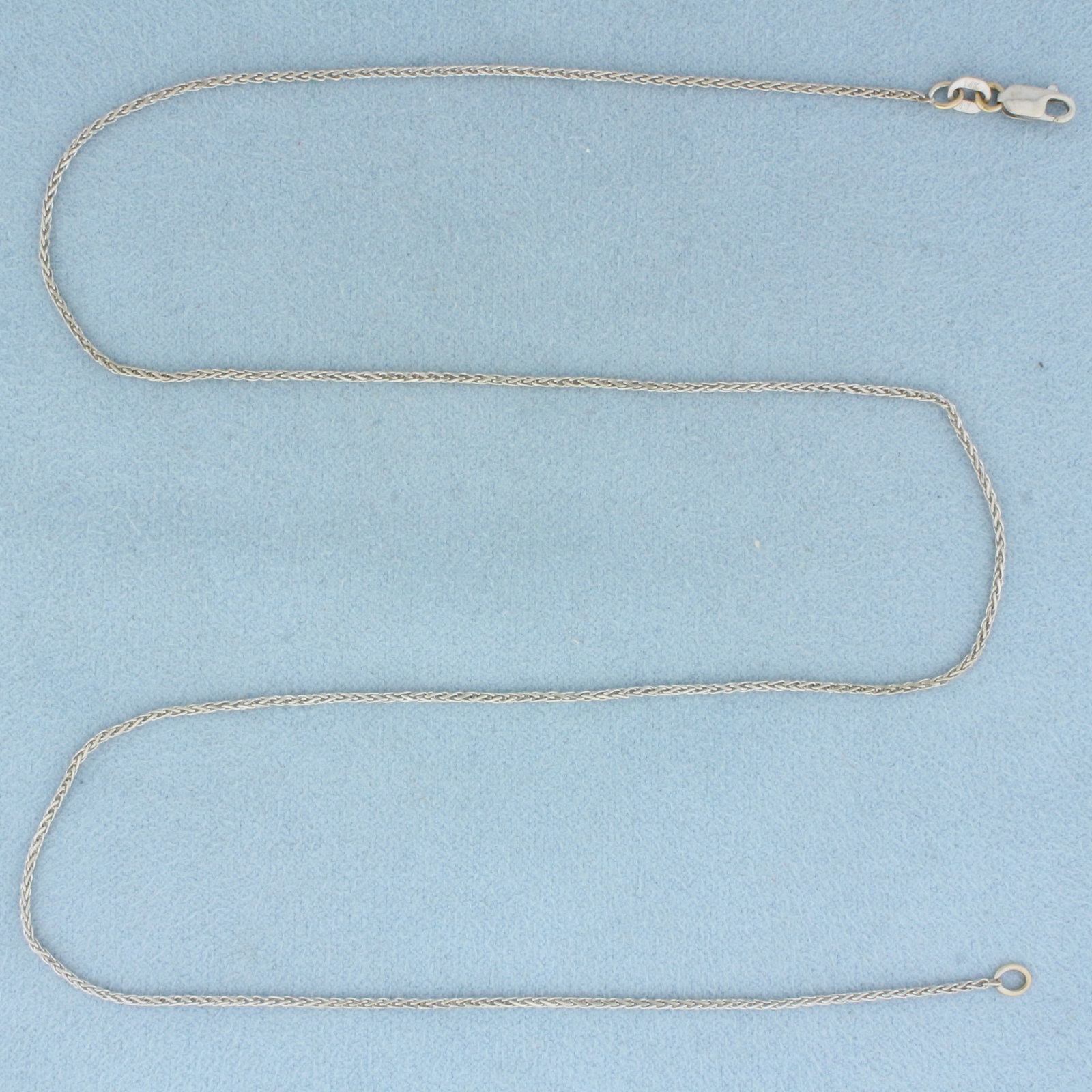 Italian 18 Inch Wheat Link Chain Necklace in 14k White Gold: In 14k White Gold. 18 inches long. 1mm wide. Wheat link. Made in Italy. Lobster clasp. 2.8g.