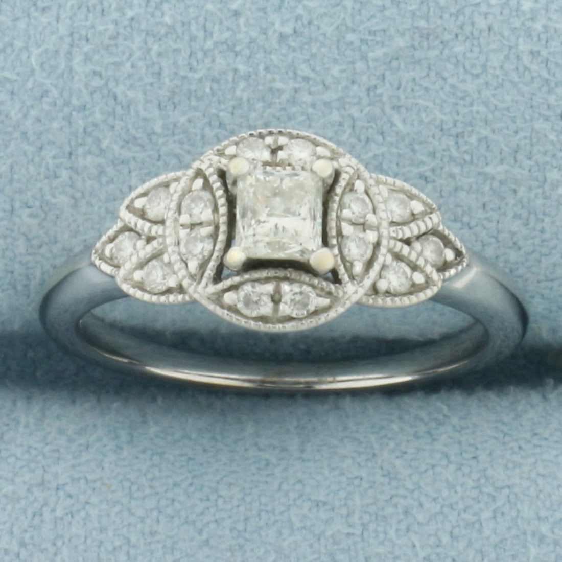 Princess Diamond Milgrain Ring in 14k White Gold: In 14k White Gold. Contains one 1/4ct high quality princess cut diamond, SI clarity/H color, eye clean, great cut for added brilliance. Also contains fourteen high quality .01ct diamonds of similar hi