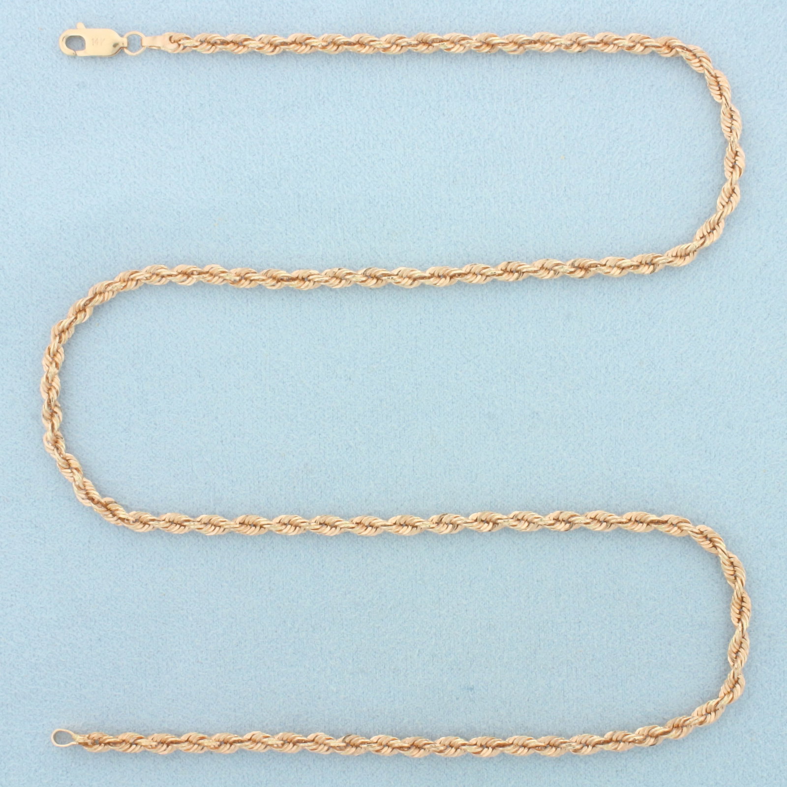 18 Inch Rope Link Chain Necklace in 14k Rose Gold: In 14k Rose Gold. 18 inches long. 3.1mm wide. Lobster clasp. 4.0g.