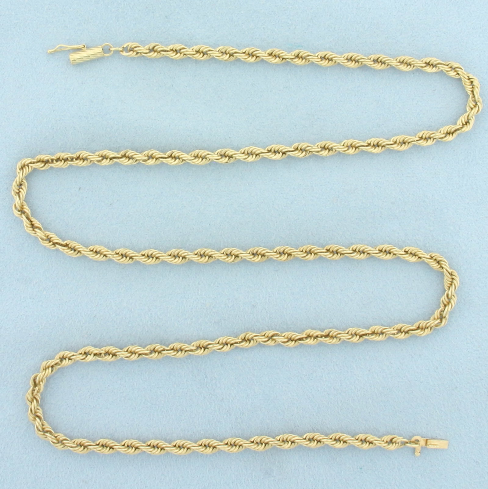 22 Inch Rope Link Chain Necklace in 14k Yellow Gold: In 14k Yellow Gold. 22 inches long. 3.5mm wide. Barrel clasp with safety latch. 8.8g.
