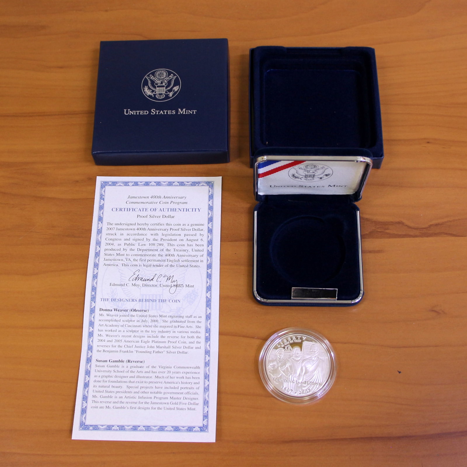 US Mint 2007 Jamestown Silver Dollar Coin OGP: Contains one 1607-2007 Jamestown 400th Anniversary Commemorative 90% Silver Dollar. Set in original government packaging and contains certificate of authenticity.