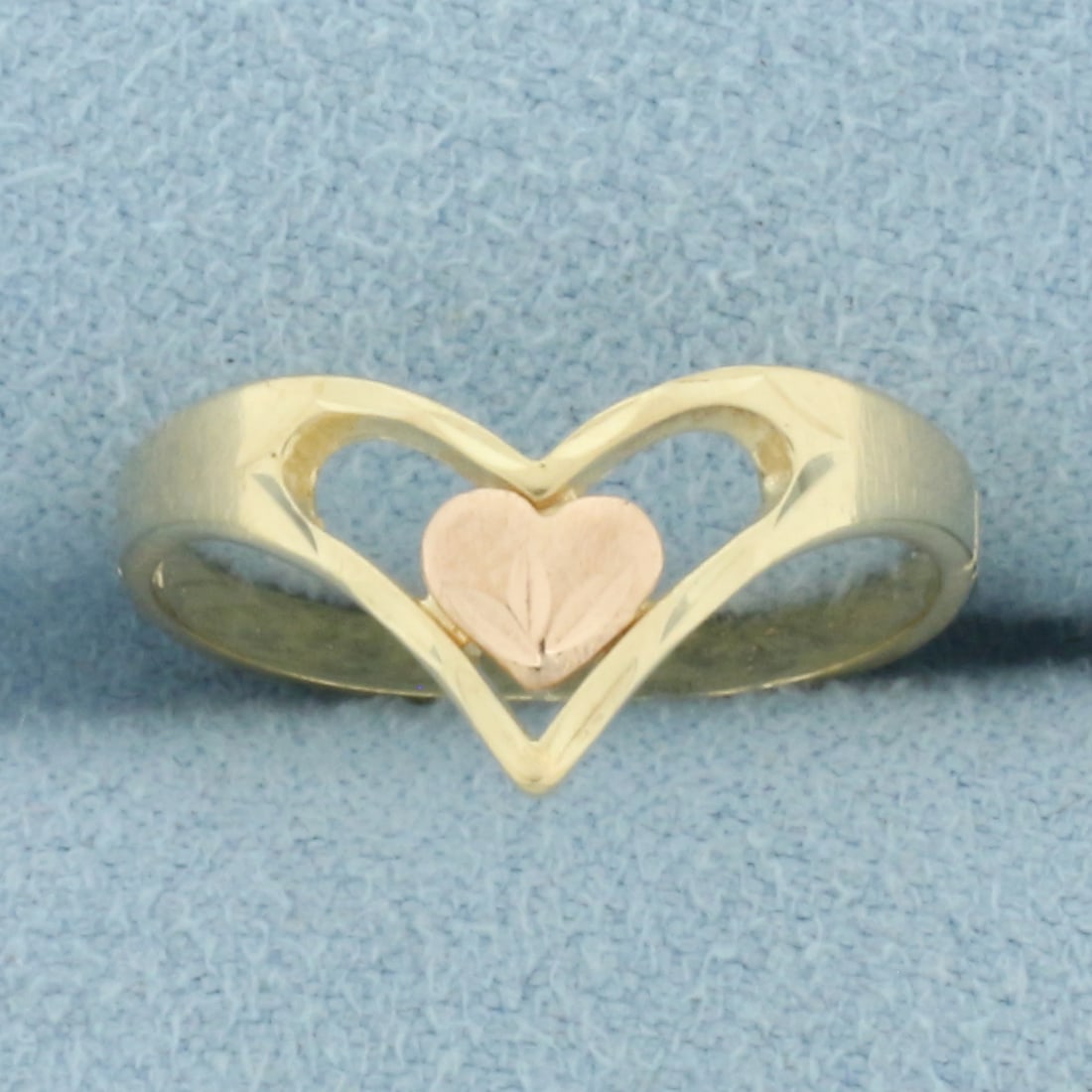 Diamond Cut Heart Ring in 14k Yellow and Rose Gold: In 14k Yellow and Rose Gold. 9.2mm wide at widest. Size 6. 1.5g.