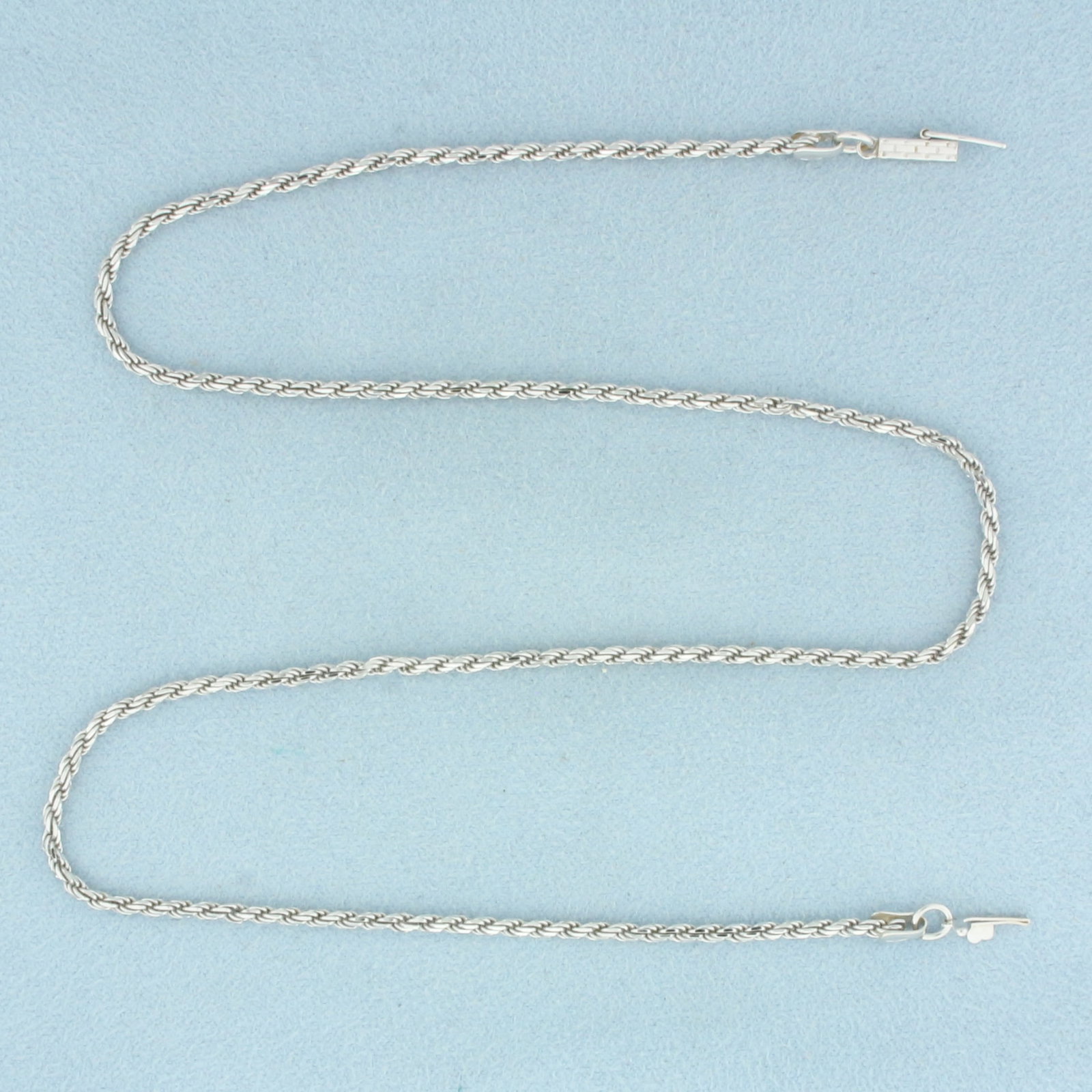 16 Inch Italian Rope Link Chain Necklace in 14k White Gold: In 14k White Gold. 16 inches long. 1.7mm thick. Italian made. Squared barrel clasp with safety latch. 6.5g.