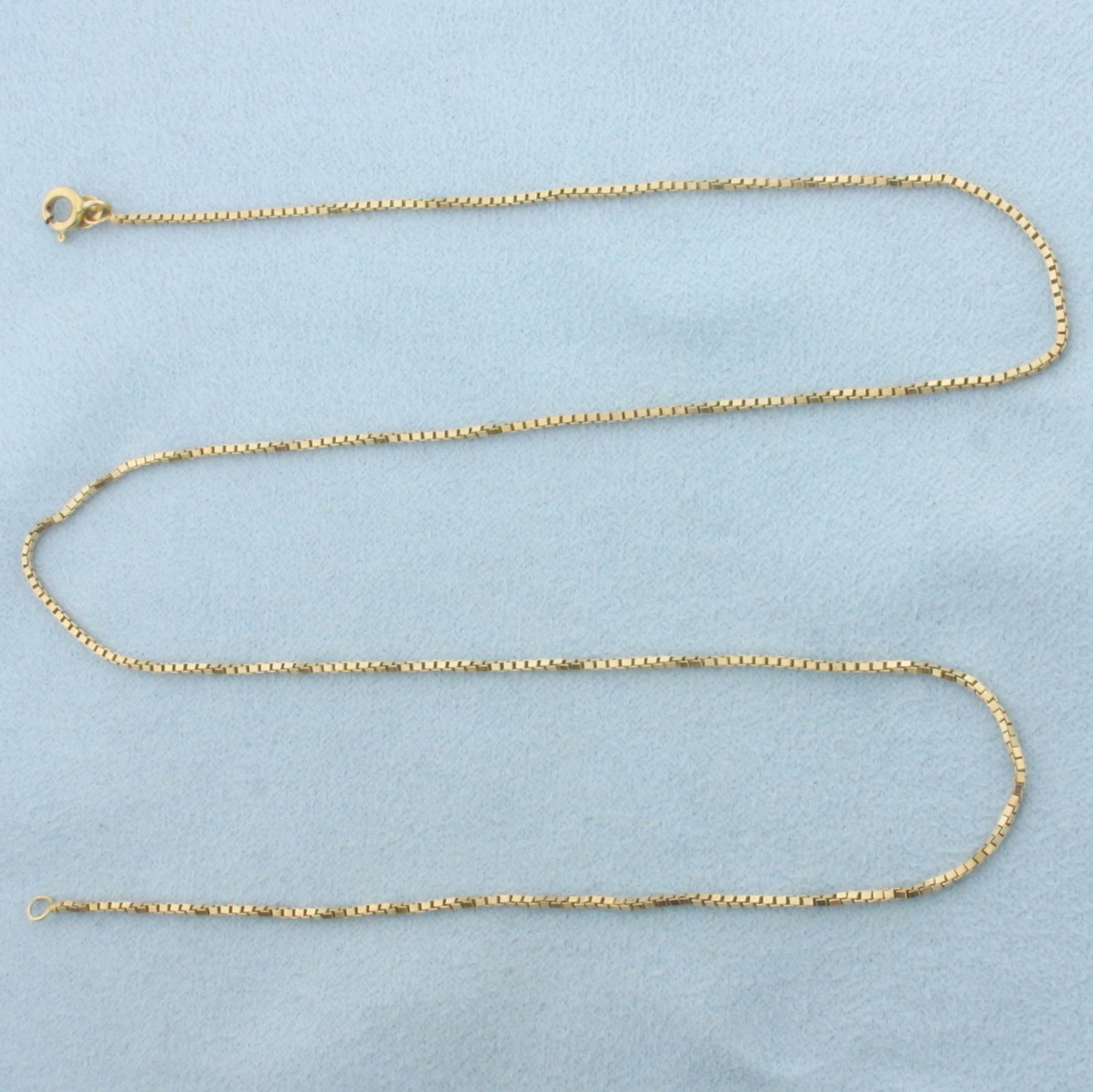 Italian 18 Inch Box Link Chain Necklace in 14k Yellow Gold: In 14k Yellow Gold. 18 inches long. 1mm wide. Box link. Made in Italy. Spring clasp. 3.2g.
