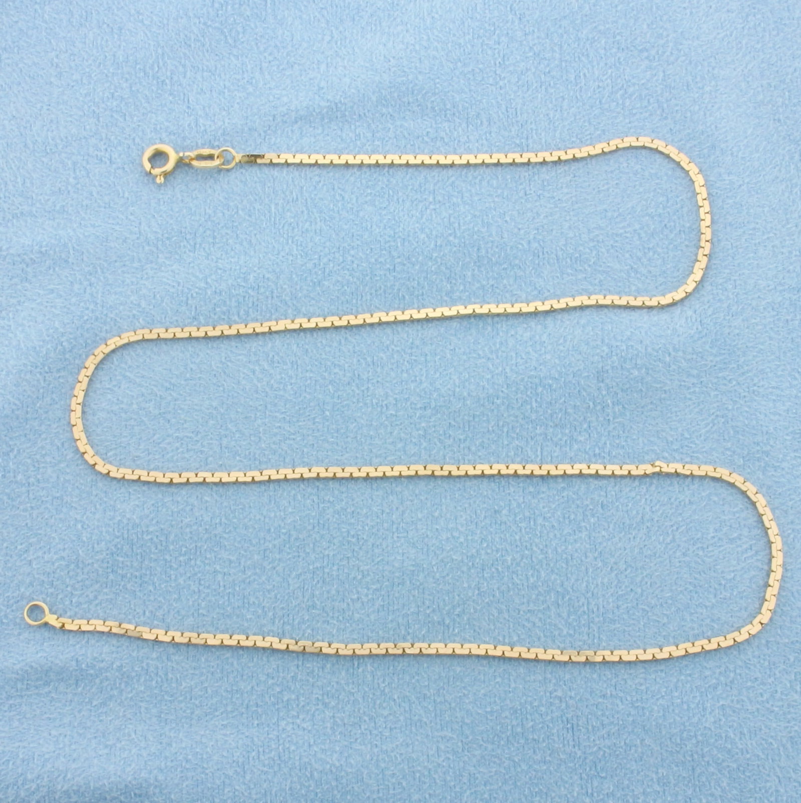 Italian 16 Inch Boston Link Chain Necklace in 14k Yellow Gold: In 14k Yellow Gold. 16 inches long. 1.4mm wide. Made in Italy. Spring clasp. 3.7g.
