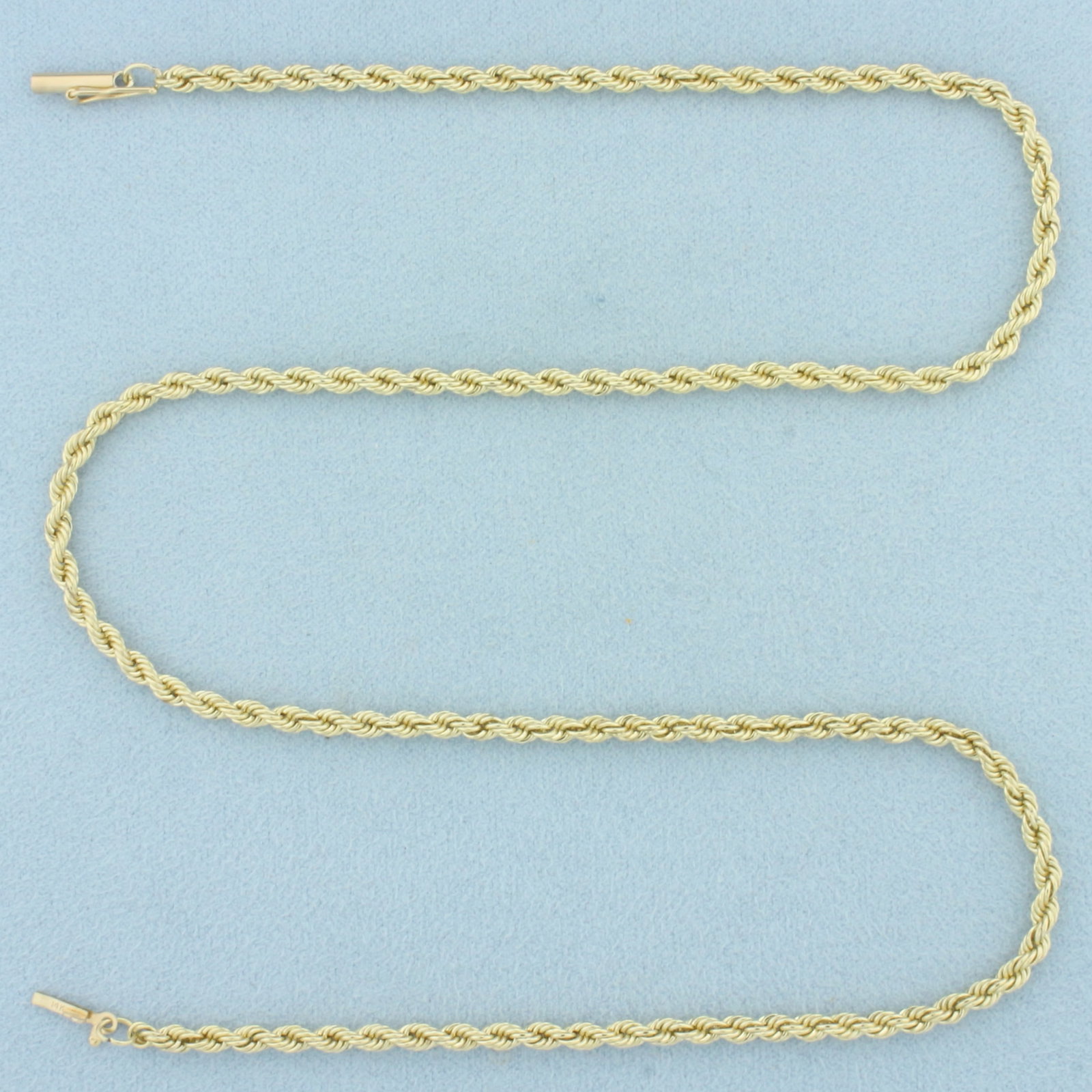 18 Inch Rope Link Chain Necklace in 14k Yellow Gold: In 14k Yellow Gold. 18 inches long. 2.9mm wide. Barrel clasp with safety latch. 13.8g.
