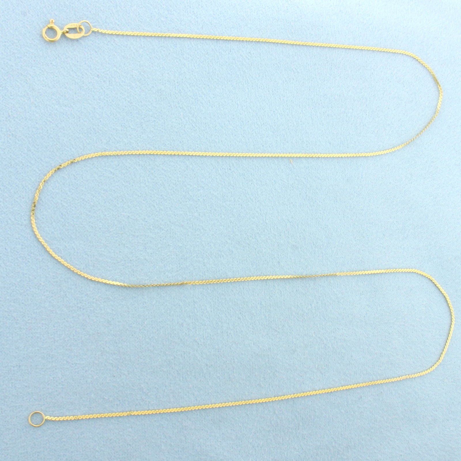 19 Inch Italian S-Link Chain Necklace in 14k Yellow Gold: In 14k Yellow Gold. 19 inches long. 0.9mm wide. Made in Italy. Spring clasp. 1.5g.