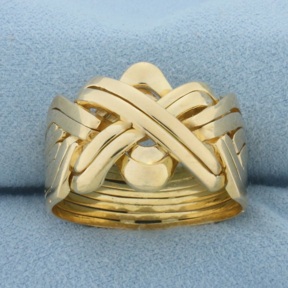 Wide 8-Band Puzzle Ring in 18k Yellow Gold: In 18k Yellow Gold. 15.5mm wide at top center of ring. 8 rings are soldered together. Size 13. 14.1g.