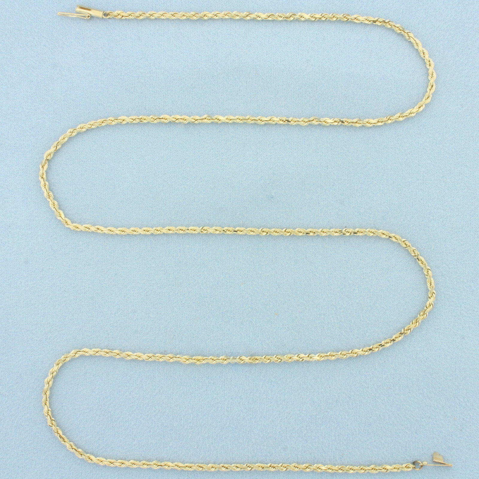 Mens 24 Inch Rope Link Chain Necklace in 14k Yellow Gold: In 14k Yellow Gold. 24 inches long. 2.4mm wide. Barrel clasp with safety latch. 11.6g.