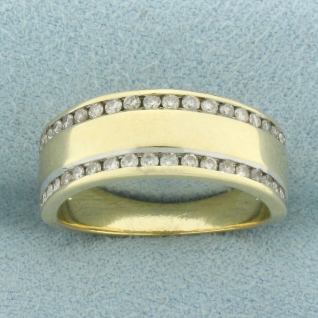 Double Diamond Line Ring in 14k Yellow Gold: In 14k Yellow Gold. Contains thirty-eight high quality .01ct diamonds, SI clarity/H color. 7.5mm wide. 7.5mm wide. Size 7.5. 5.9g.