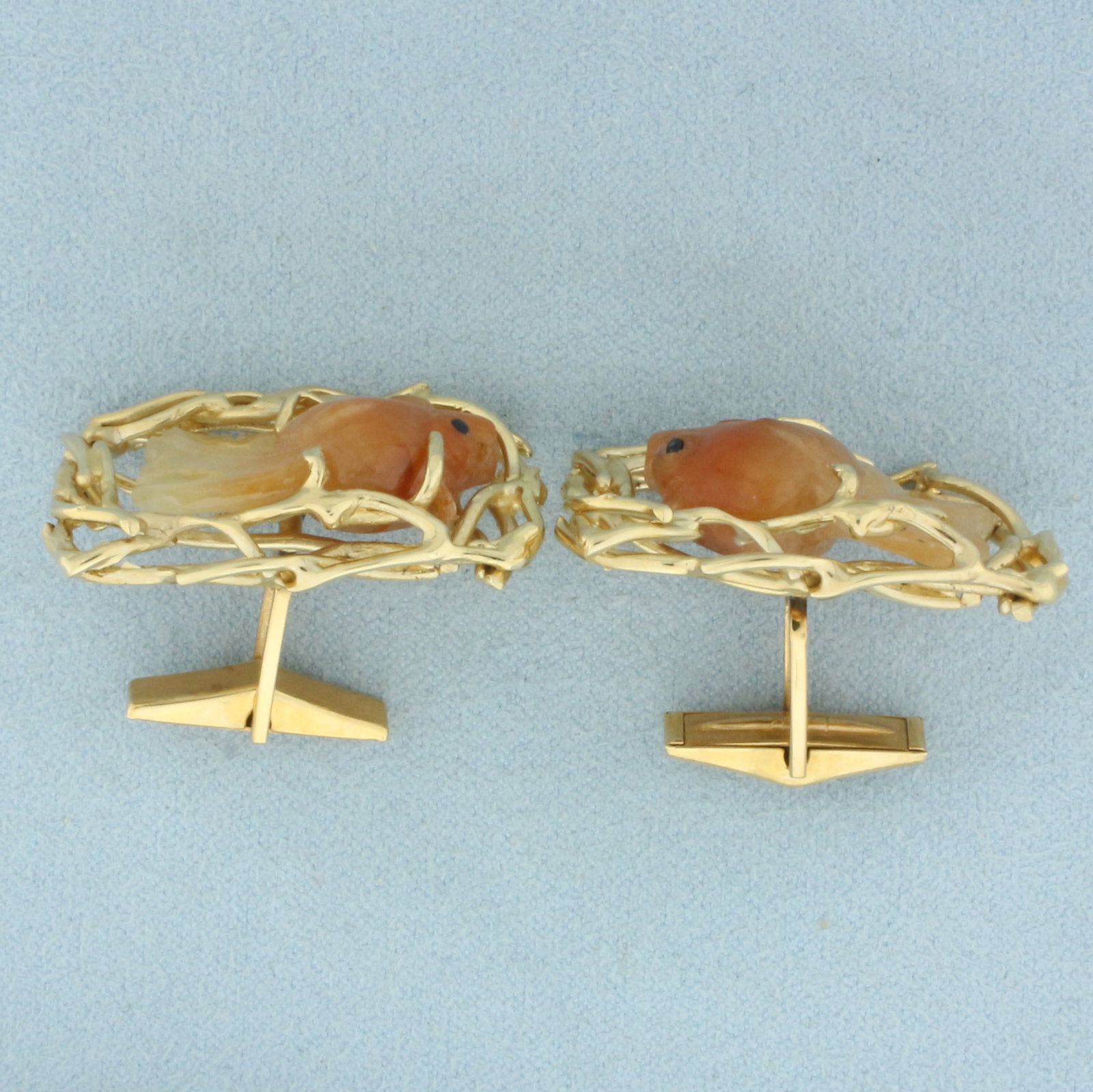 Carved Jade Fish Cufflinks in 14k Yellow Gold: In 14k Yellow Gold. Contains two 24mm high quality hand carved natural Jade gemstones. 1 1/4 inch long. 7/8 inch wide. 23.2g.