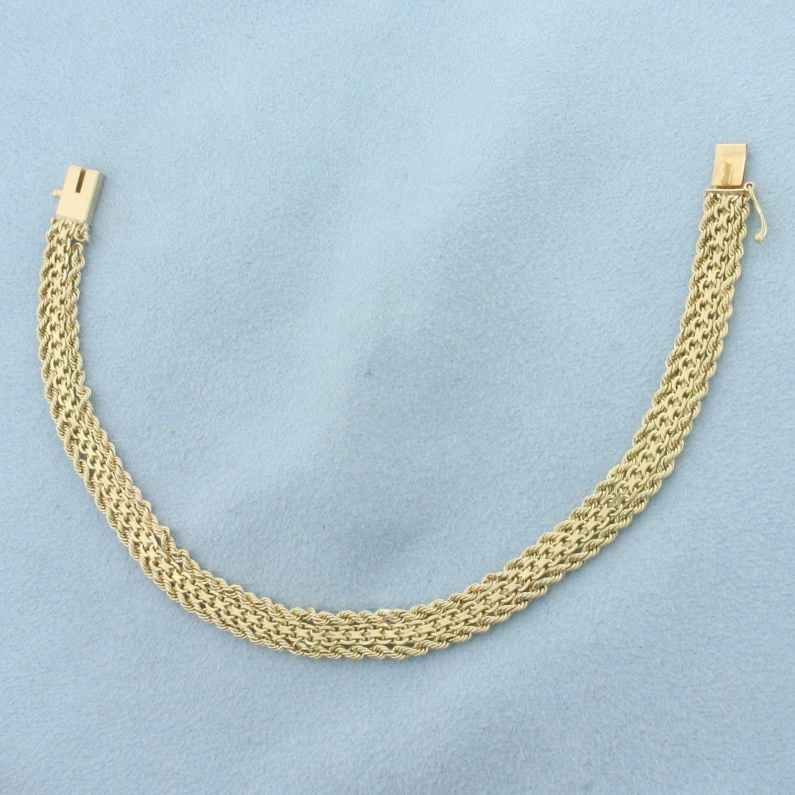 Bismark and Rope Link Bracelet in 14k Yellow Gold: In 14k Yellow Gold. 7 1/8 inches long. 6mm wide. Slide clasp with safety latch. 8.3g.