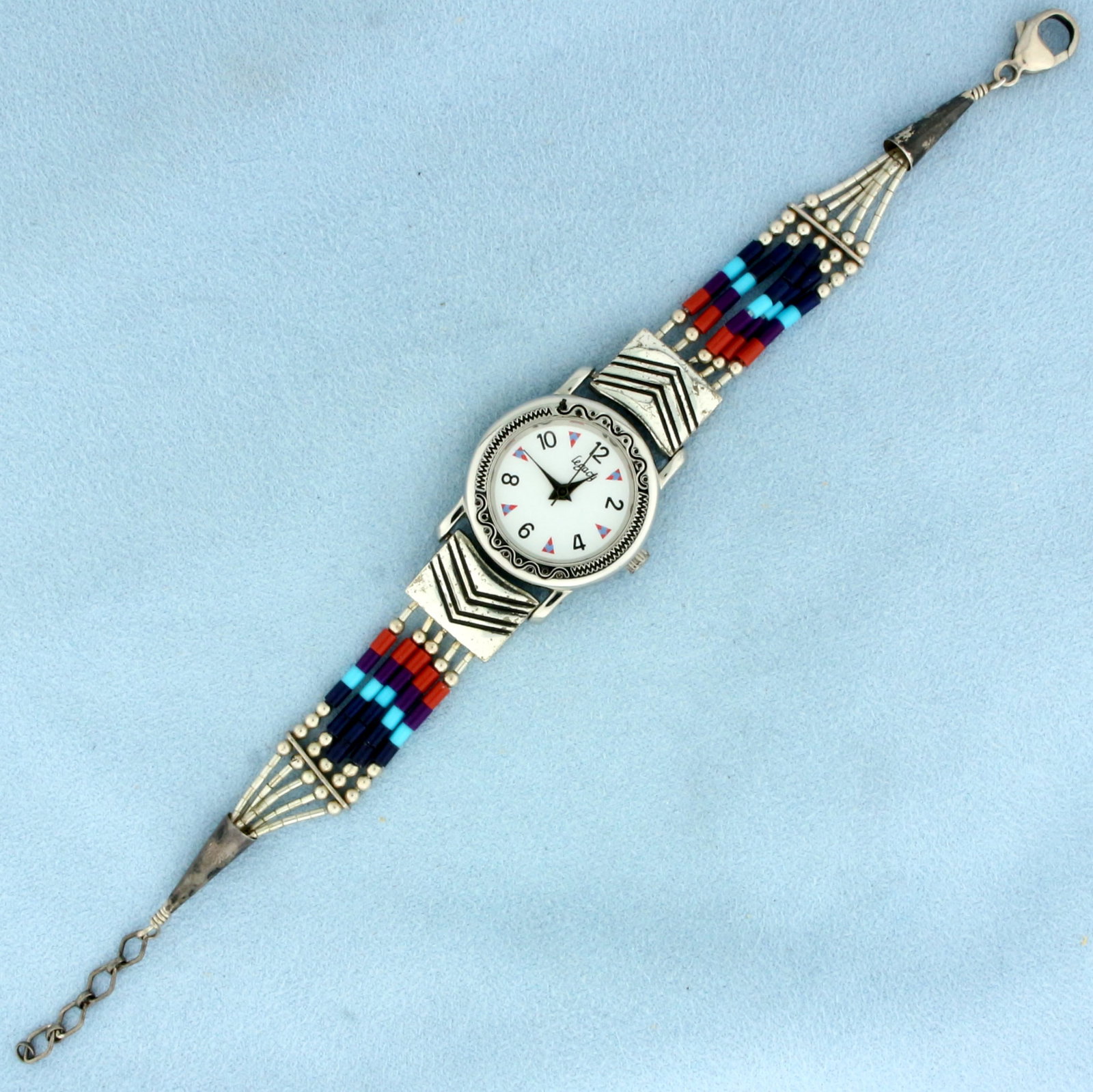 Native American Indian Beaded Quartz Watch in Sterling Silver: In .925 sterling silver. Quartz movement. Adjustable length from 6.5 inches to 7.5 inches long. Case is 0.875 inches in diameter. New battery, runs great! 20.2g.