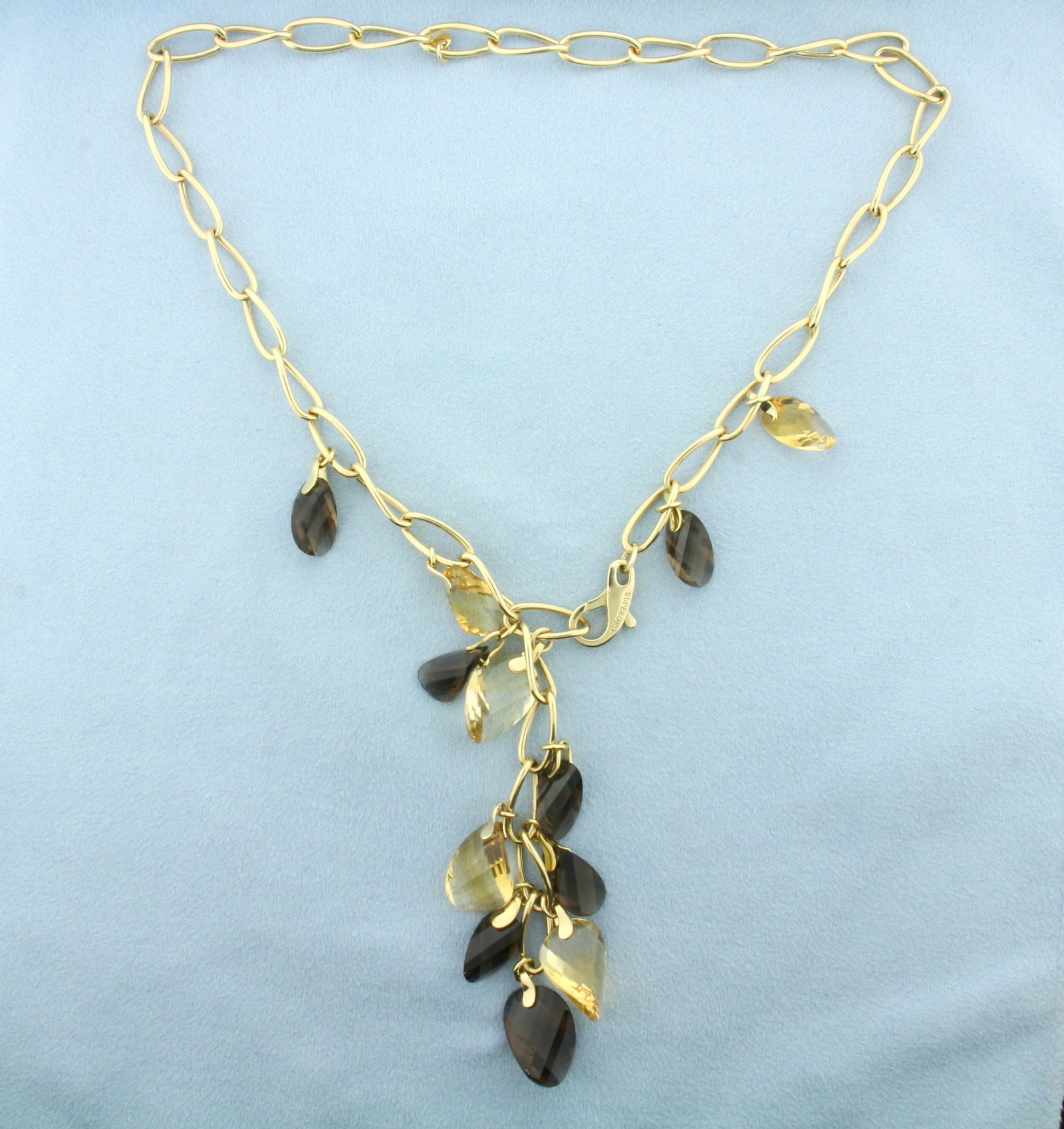Italian Designer Smoky Topaz and Citrine Dangle Necklace in 14k Yellow Gold: In 14k Yellow Gold. Contains 12-18mm high quality fancy briolette checkerboard cut natural Citrine and Smoky Topaz gemstones with intense color. 16 inches long chain, 6.8mm wide. 3 1/2 inches long dan
