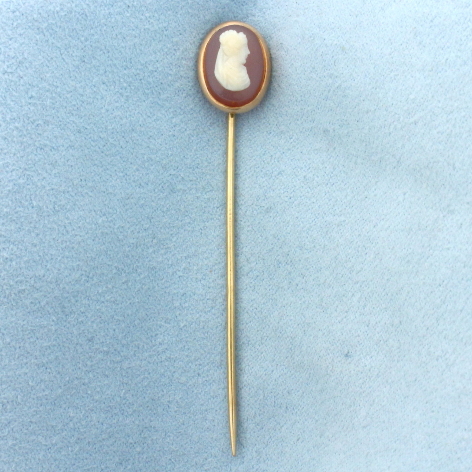Vintage Hand Carved Cameo Stick Pin in 14k Yellow Gold: In 14k Yellow Gold. Contains a 12mm x 9mm hand carved Cameo. 2.5 inches long by 3/8 inch wide. 2.3g.