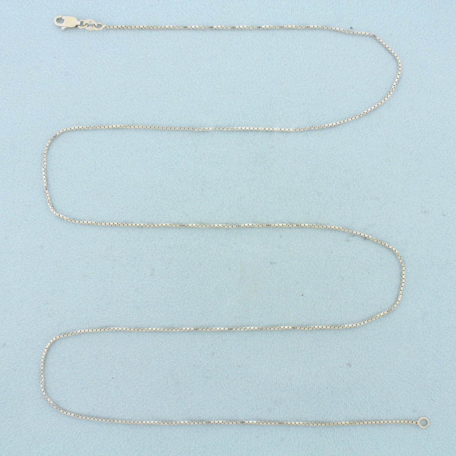 24 Inch Box Link Chain Necklace in 14k White Gold: In 14k White Gold. 24 inches long. 1mm wide. Lobster clasp. 3.9g.