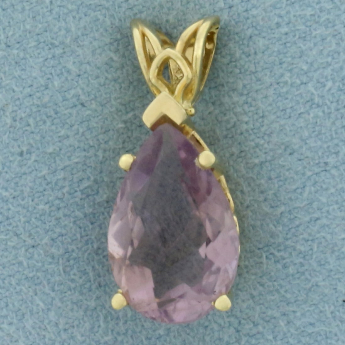 Pear Cut Rose de France Amethyst Pendant in 14k Yellow Gold: In 14k Yellow Gold. Contains one 9x14mm high quality pear cut natural Rose de France Amethyst gemstone, approximately 3.5cts, with bright color and excellent clarity. 7/8 inch long. 3/8 inch wide. 2.6