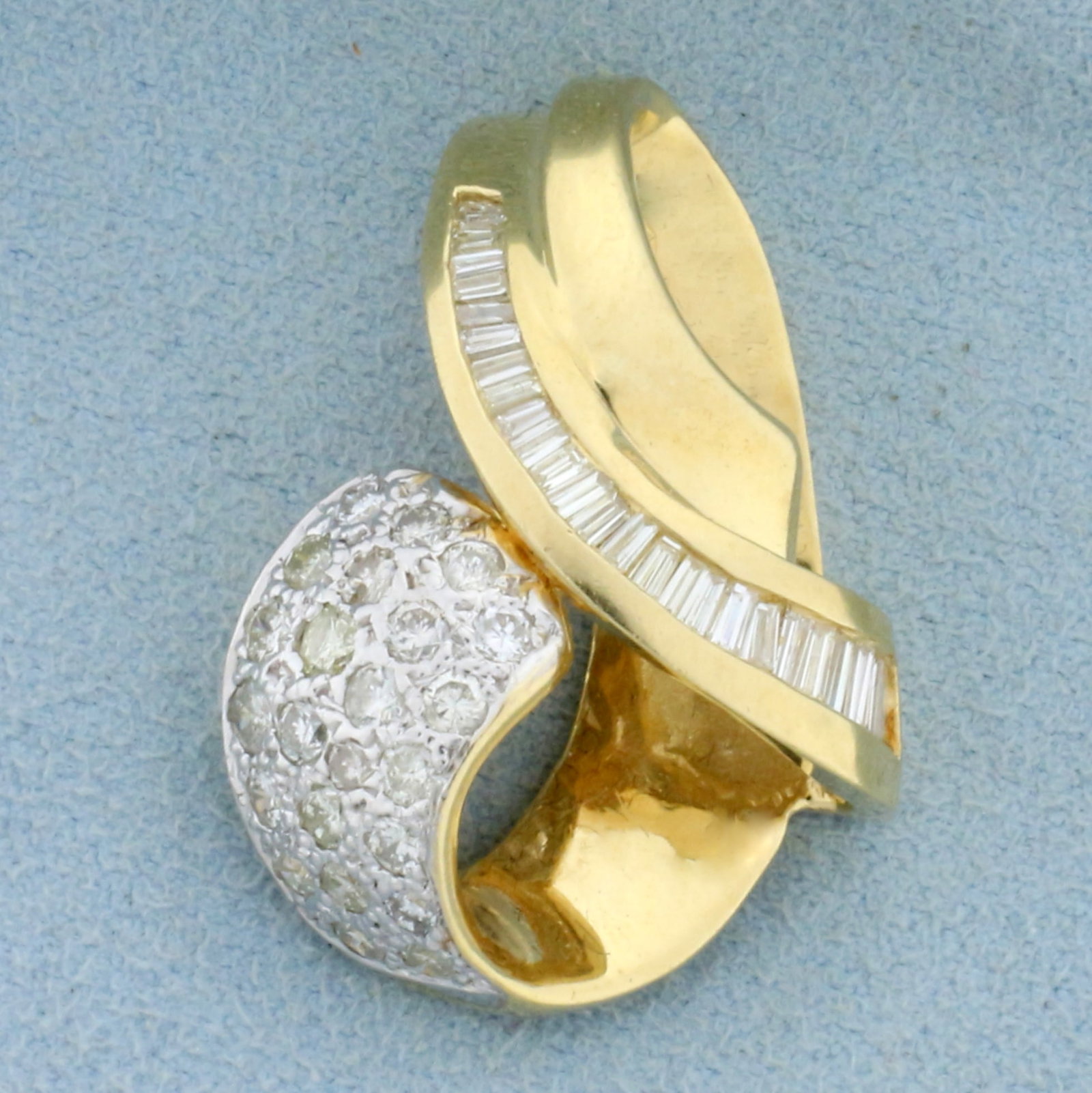 Designer Round and Baguette Diamond Pendant or Slide in 14K Yellow Gold: In 14K Yellow Gold. Contains twenty three high quality .03ct round Diamonds. Also contains twenty five high quality baguette Diamonds ranging from .01 .05ct each, .8ct TW. All diamonds SI clarity/I co