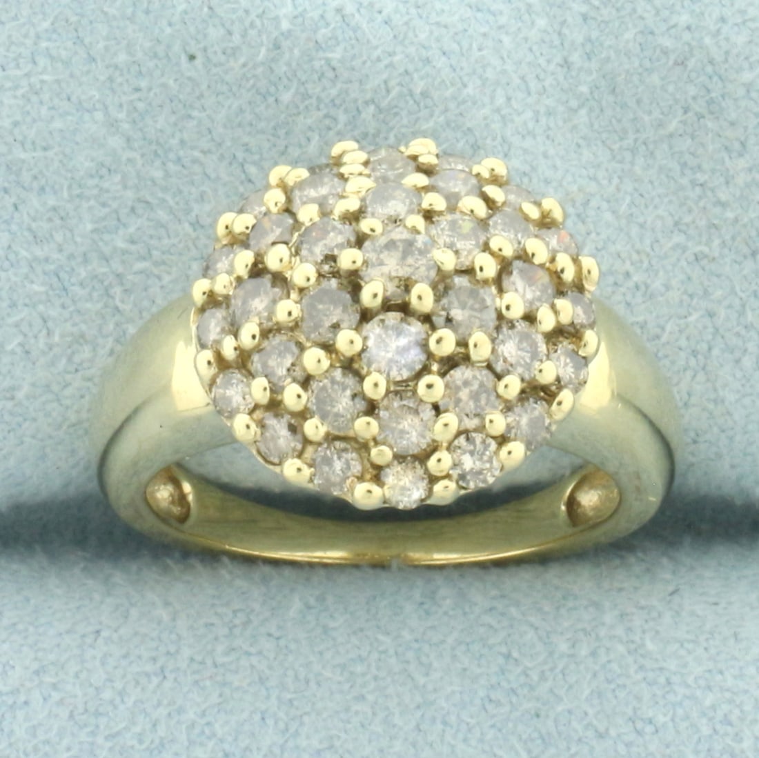 Champagne Diamond Cluster Ring in 10k Yellow Gold: In 10k yellow gold. Contains 34 high quality diamonds, 1.5ct TW, with warm champagne color. Size: 7. 5.1g.