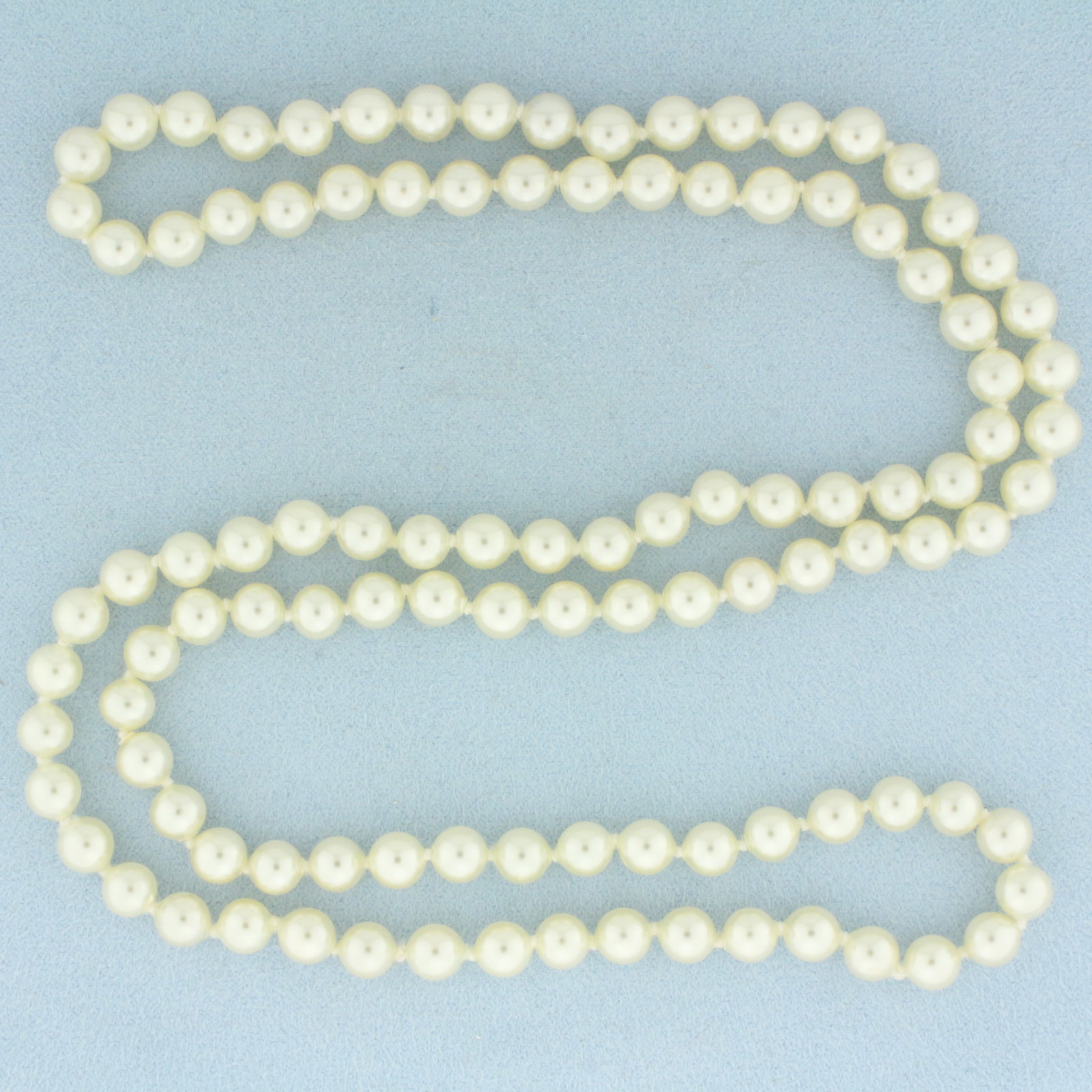 29 Inch Cultured Akoya Pearl Strand Necklace: Contains 6-6.2mm high quality cultured akoya pearls with high luster. 29 inches long. Hand knotted.