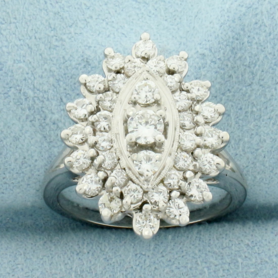 Vintage Diamond Cocktail Ring in 14k White Gold: In 14k White Gold. Contains 35 high quality diamonds ranging from .03ct to .2ct each, 1.5ct TW, G color/SI clarity . 22mm wide at center. Size 9. 8.3g.