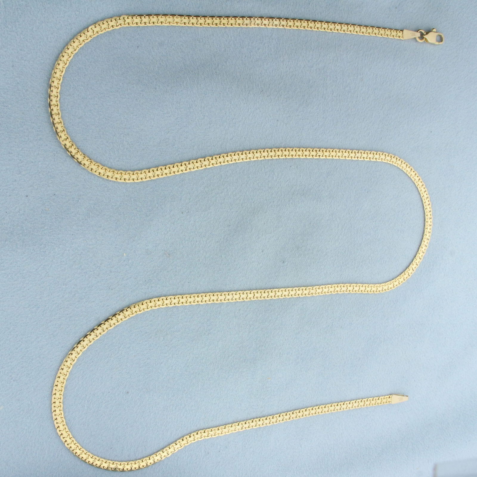 Italian 24 Inch Bismark Link Chain Necklace in 14k Yellow Gold: In 14k Yellow Gold. 24 inches long. 3.1mm wide. Italian made. Lobster clasp. 10.4g.