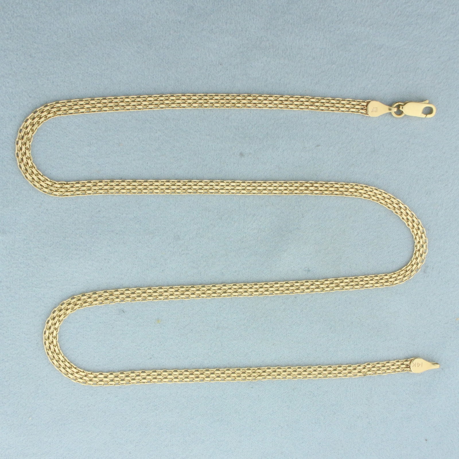 20 Inch Bismark Link Chain Necklace in 14k Yellow Gold: In 14k Yellow Gold. 20 inches long. 4mm wide. Lobster clasp. 9.2g.