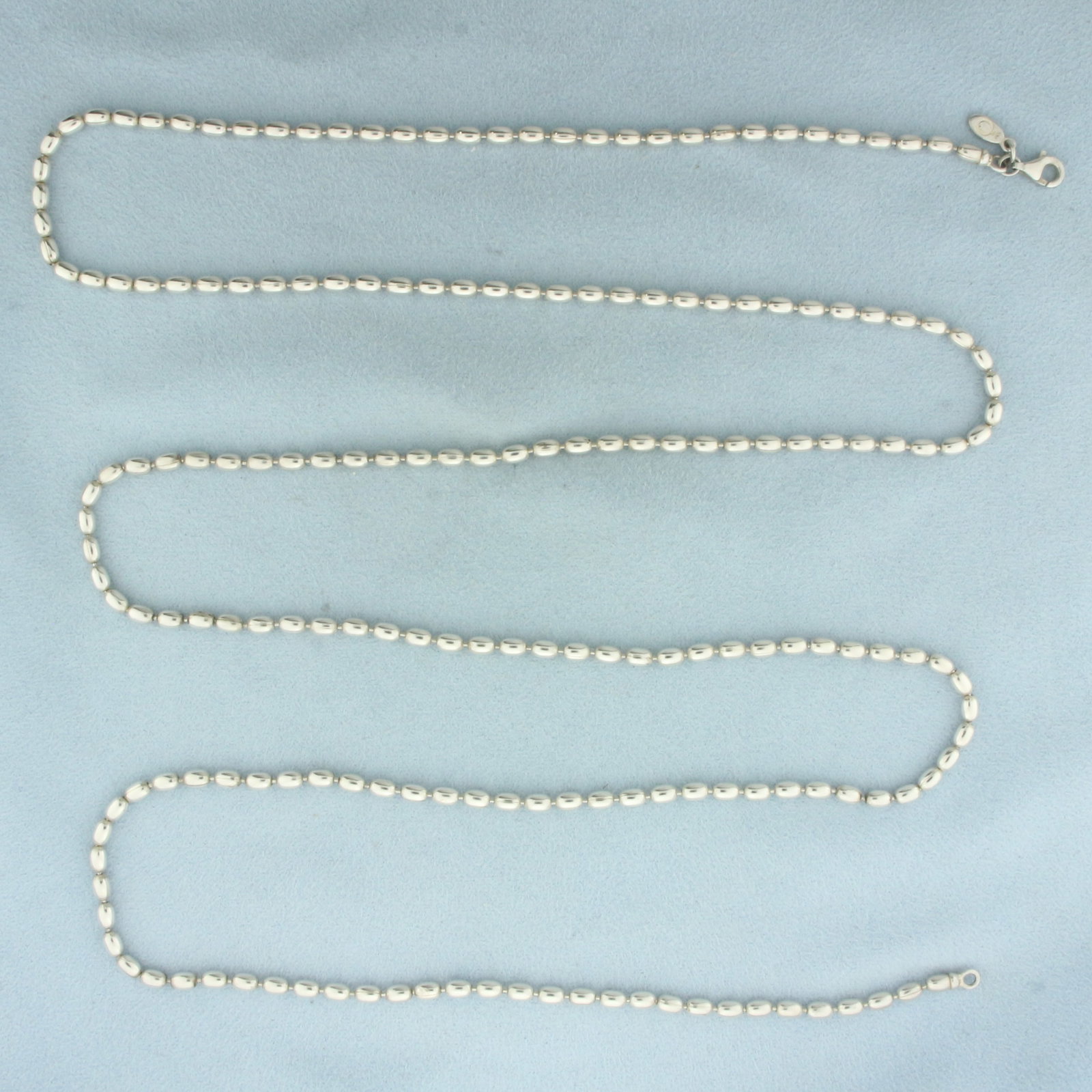 Pandora 40 Inch Oval Rice Bead Necklace in Sterling Silver: In .925 sterling silver. Guaranteed authentic. Measures 40" long, 3mm wide. Lobster clasp. 28.6g.