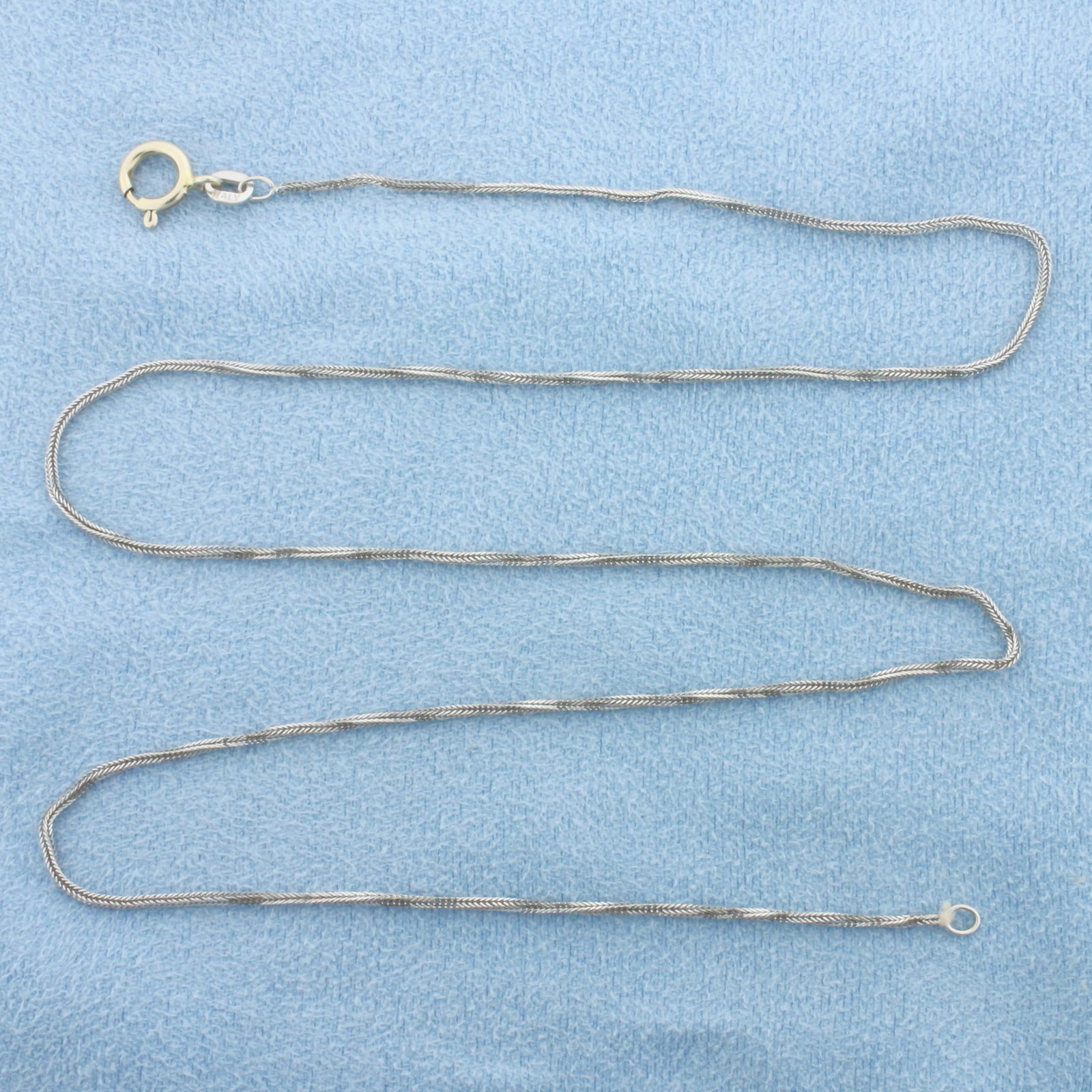 Italian 18 Inch Foxtail Link Chain Necklace in 14k White Gold: In 14k White Gold. 18 inches long. 0.9mm wide. Made in Italy. Spring clasp. 1.9g.