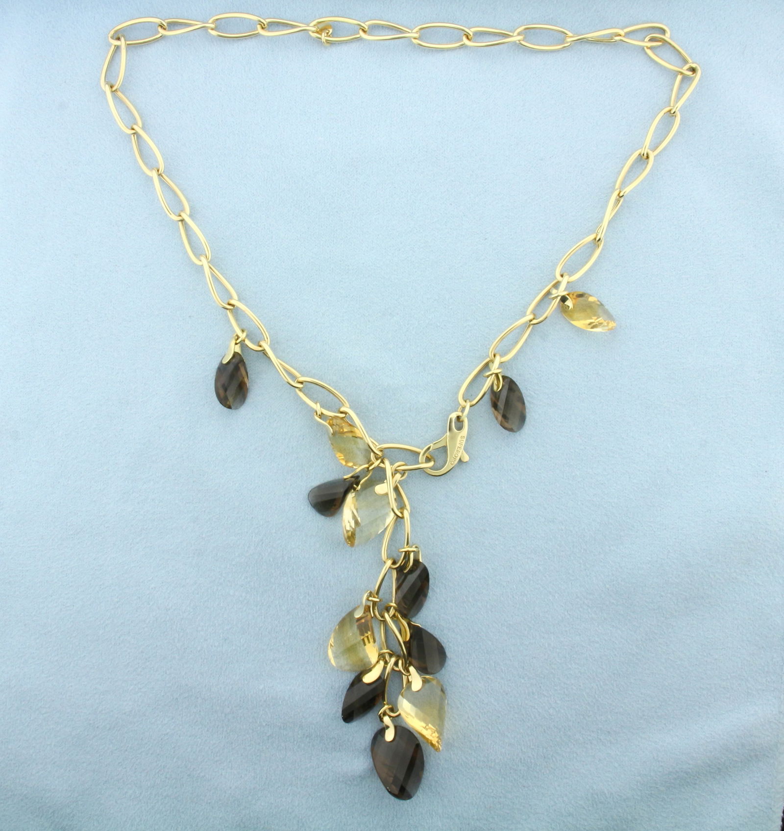 Italian Designer Smoky Topaz and Citrine Dangle Necklace in 14k Yellow Gold: In 14k Yellow Gold. Contains 12-18mm high quality fancy briolette checkerboard cut natural Citrine and Smoky Topaz gemstones with intense color. 16 inches long chain, 6.8mm wide. 3 1/2 inches long dan