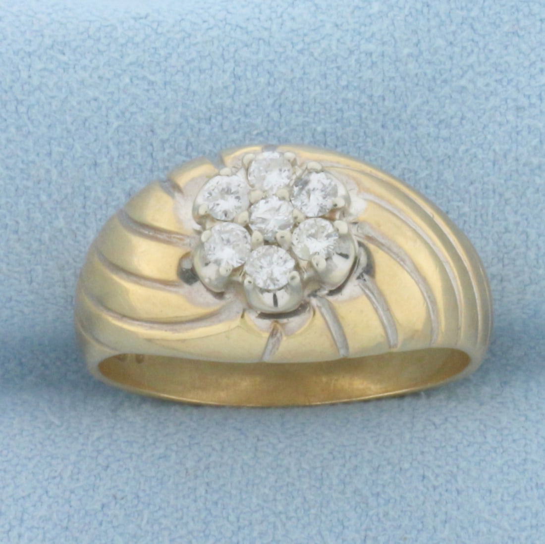 Vintage Diamond Flower Design Dome Ring in 14K Yellow Gold: In 14K Yellow Gold. Contains seven round brilliant diamonds, 1/3ct TW, SI clarity/H color. Size 10 1/4. 7.2g
