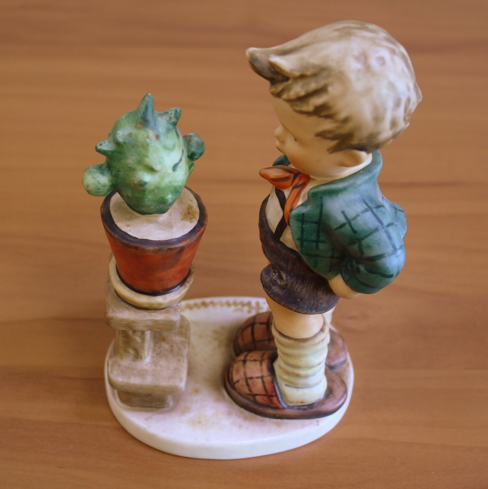 Goebel "Confidentially" Hummel Figurine: 6 inches tall. 4 1/4 inches wide at widest. Model #314.