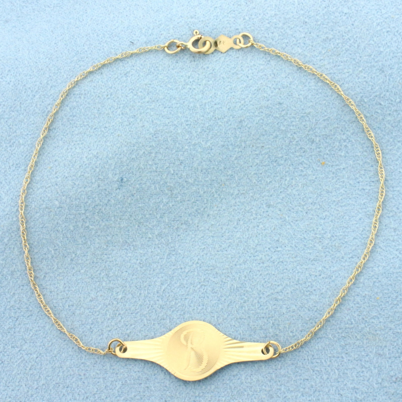 B Initial Monogram Bracelet in 14k Yellow Gold: In 14k Yellow Gold. 7 3/8 inches long. 10mm wide at center. Spring clasp. .6g.