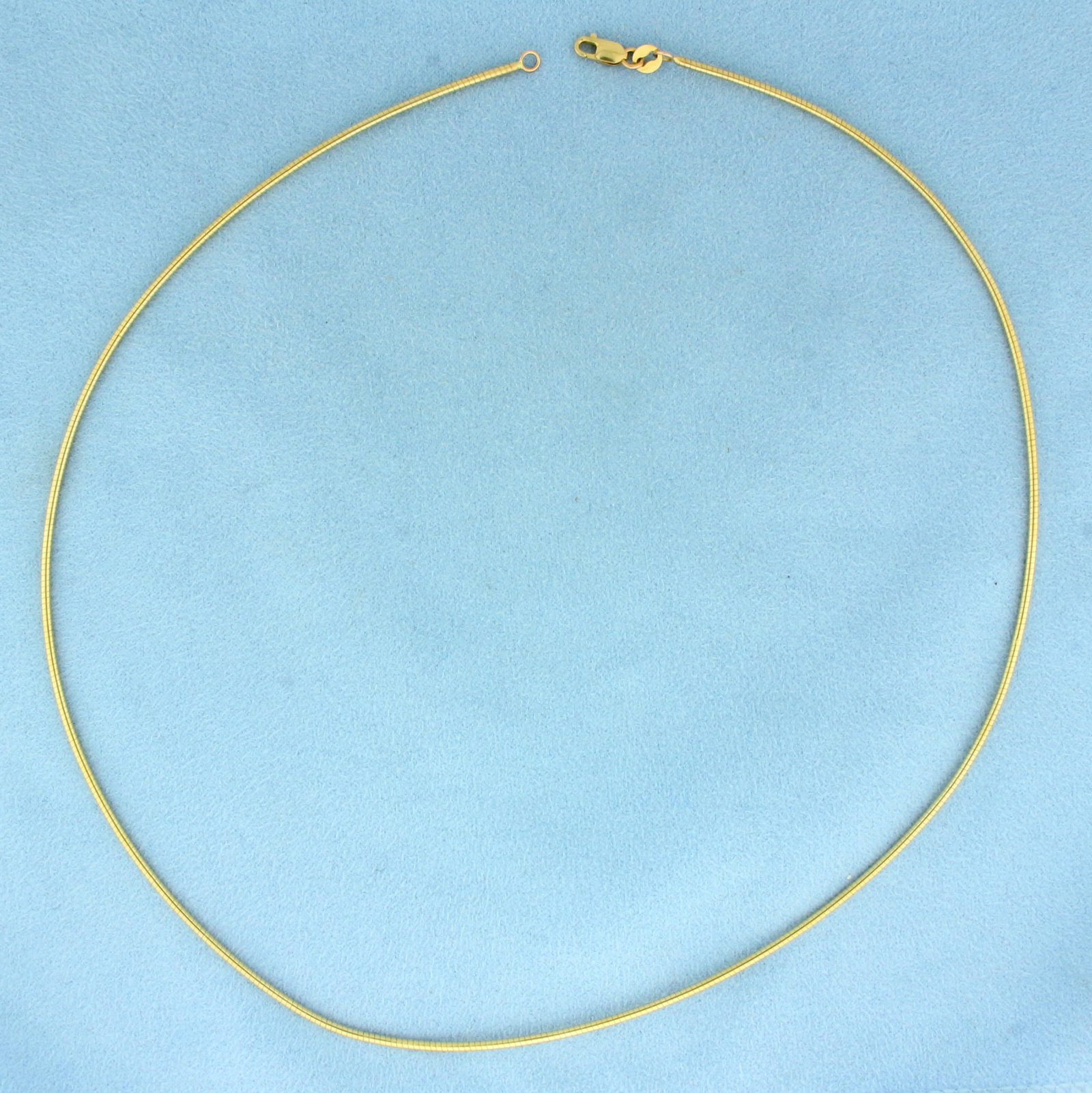 18 Inch Snake Link Chain Necklace in 14k Yellow Gold: In 14k Yellow Gold. 18 inches long. 1.5m thick. Lobster clasp. 8.2g.