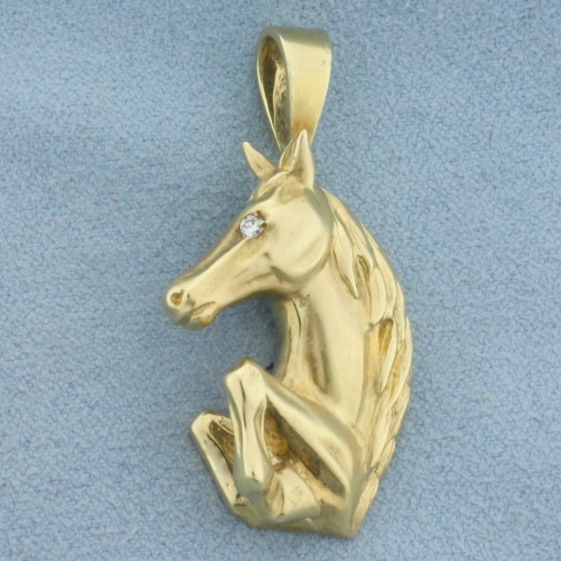 Designer Maurice Katz Diamond Horse Pendant in 14K Yellow Gold: In 14K Yellow Gold. Contains one high quality .02ct Diamond, SI clarity/G color. 1 1/2 inches long including bale. 7/8 inch wide. 9.4g
