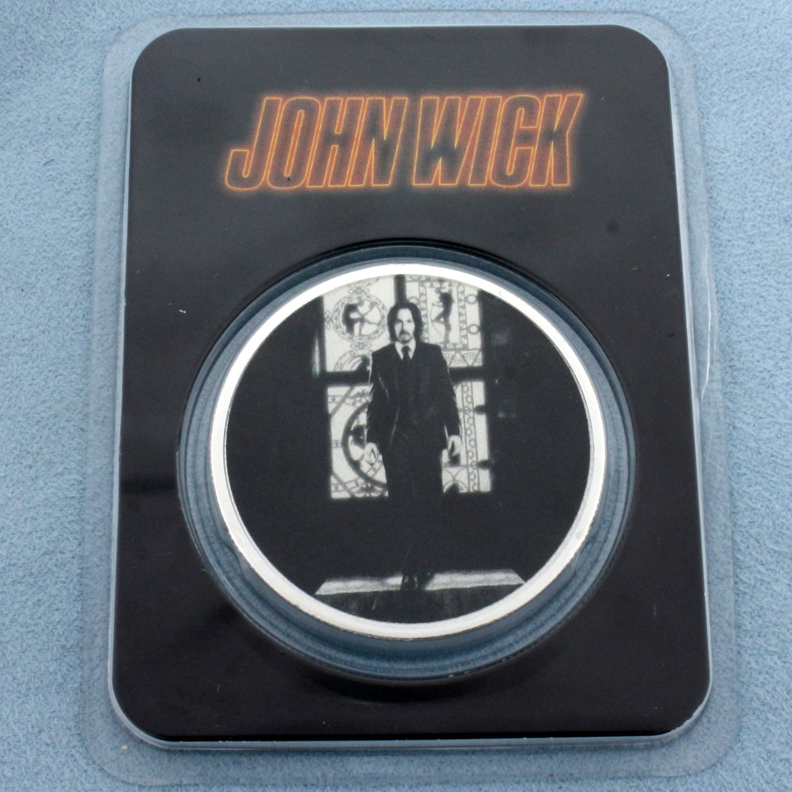 John Wick 1 oz Fine Silver Bullion Baba Yaga Round in TEP Holder Discontinued Collectable: In Tamper Evident Packaging. One ounce of fine silver, .999 purity. Made by APMEX. Discontinued, a collectable coin. 4