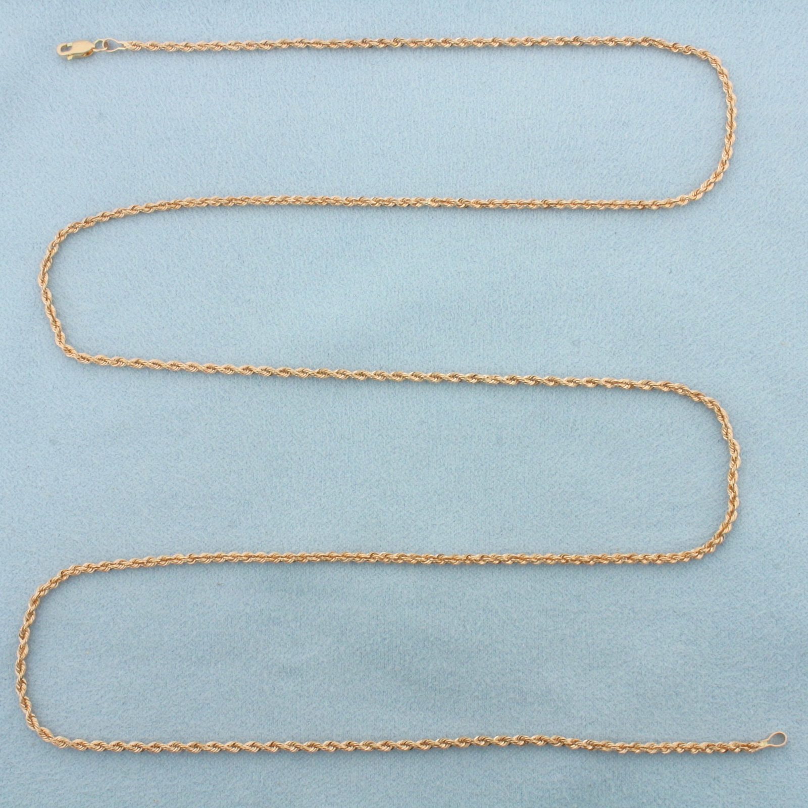 26 Inch Rope Link Chain Necklace in 14k Rose Gold: In 14k Rose Gold. 26 inches long. 1.8mm wide. Lobster clasp. 2.6g.