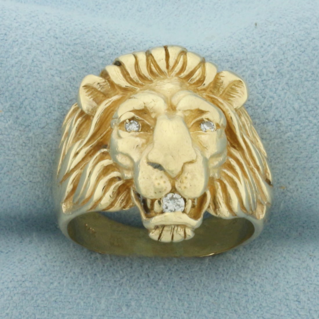 Mens Lion Diamond Ring in 14K Yellow Gold: In 14k yellow gold. Measures 23mm wide at top of ring. Contains two .01ct and one .01ct high quality diamonds. Size 9. 14.2g