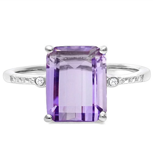 3CT Emerald Cut Amethyst and Diamond Ring in Sterling Silver: In platinum over .925 sterling silver. Contains one 3ct amethyst with excellent color and clarity. Accented with two genuine diamonds, .01ctw. Size 8. 2.8g