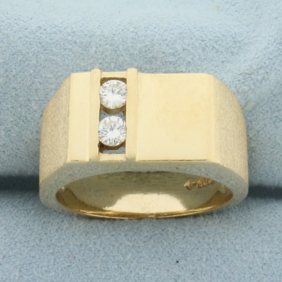 Men's Diamond Signet Ring in 14k Yellow Gold: In 14k Yellow Gold. Contains two 1/8ct high quality diamonds, 1/4ct TW, VS clarity/H colo0r. 10.5mm wide at top of ring. Can engrave initials on flat panel of front of ring. Size 9.5. 11.7g.