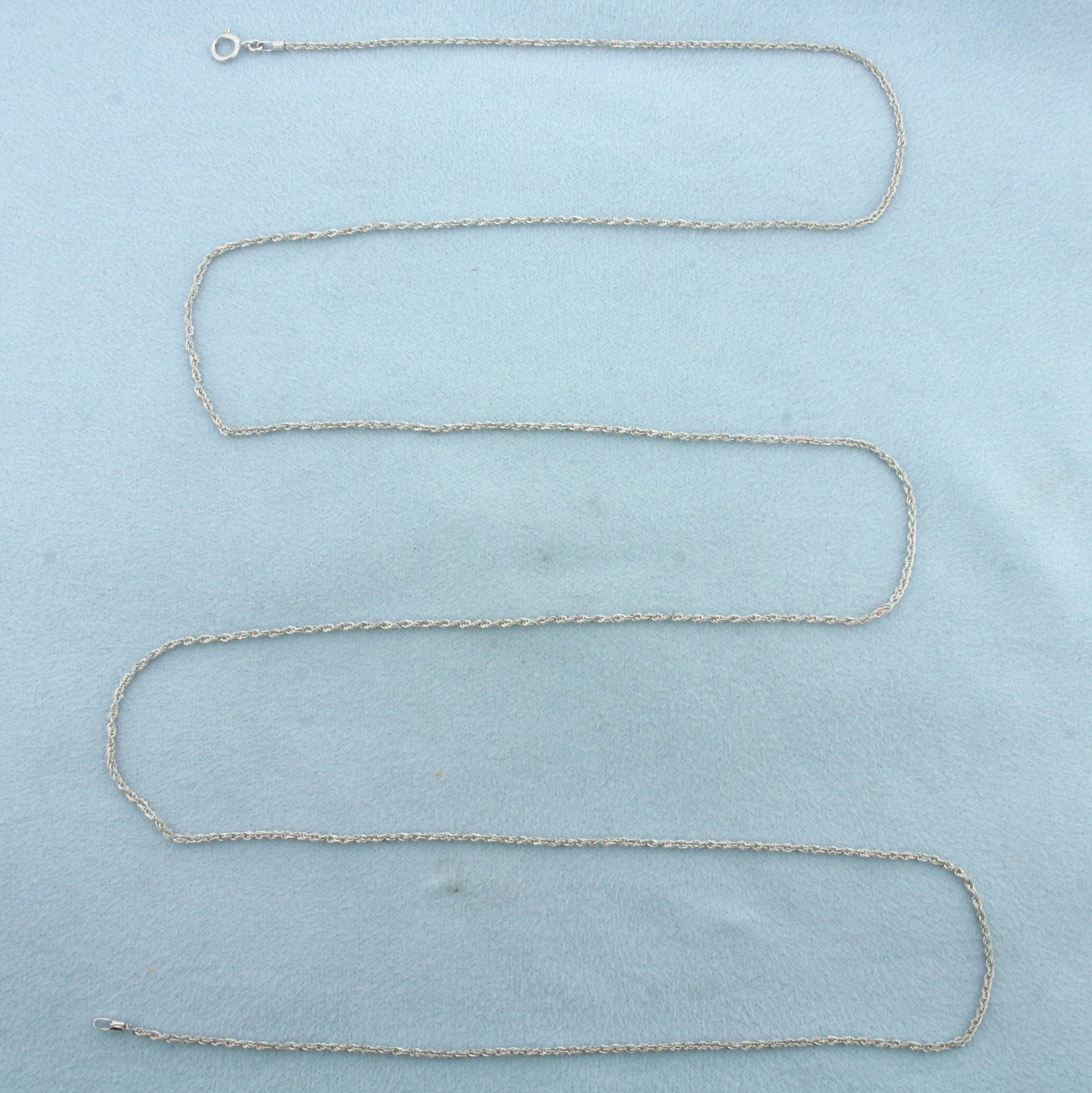33 Inch Rope Link Chain Necklace in 14k White Gold: In 14k White Gold. 33 inches long. 1.3mm wide. Spring clasp. 1.3g.